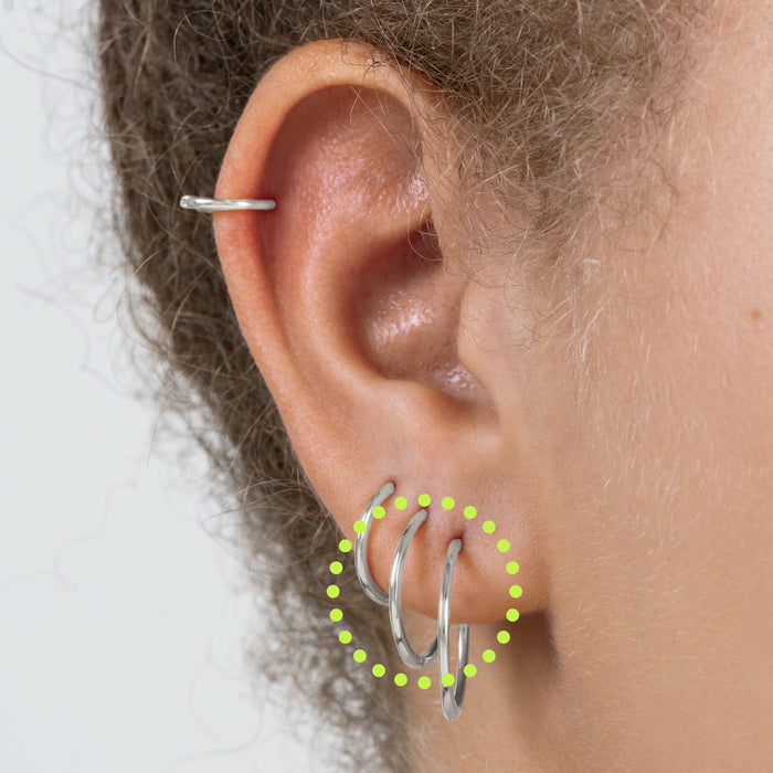 Medium sized slim simple silver hoop. color:null|silver
