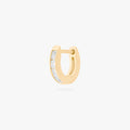 This is an image of a 14K gold plated huggie earring with 4 baguette cut, bezel set crystal CZs along the edge.
