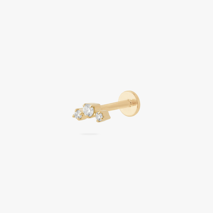 Micro gold cluster flatback stud with 3 small cz stones on a white background