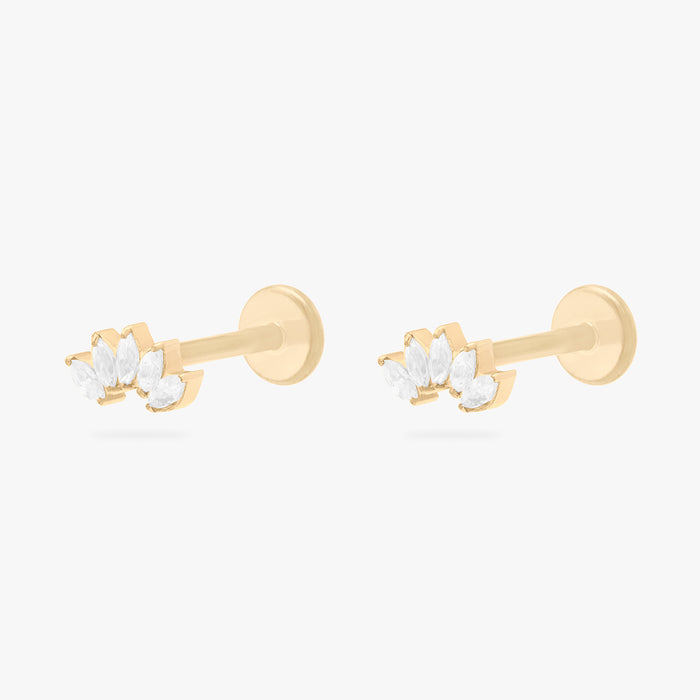 This is an image of a pair of micro-sized gold toned studs with CZ's in a crown marquise shape. [pair] color:null|gold/clear