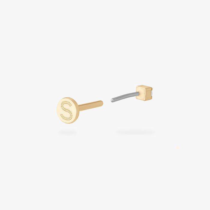 Gold micro CZ flatback stud earring with engraved letter S shown from side angle with flat backing visible