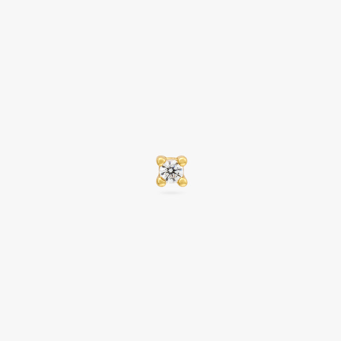 A gold micro stud with a clear cz gem color:null|gold/clear