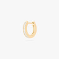 This is an image of a 14K gold plated huggie earring with 6 baguette cut, bezel set crystal CZs along the edge.