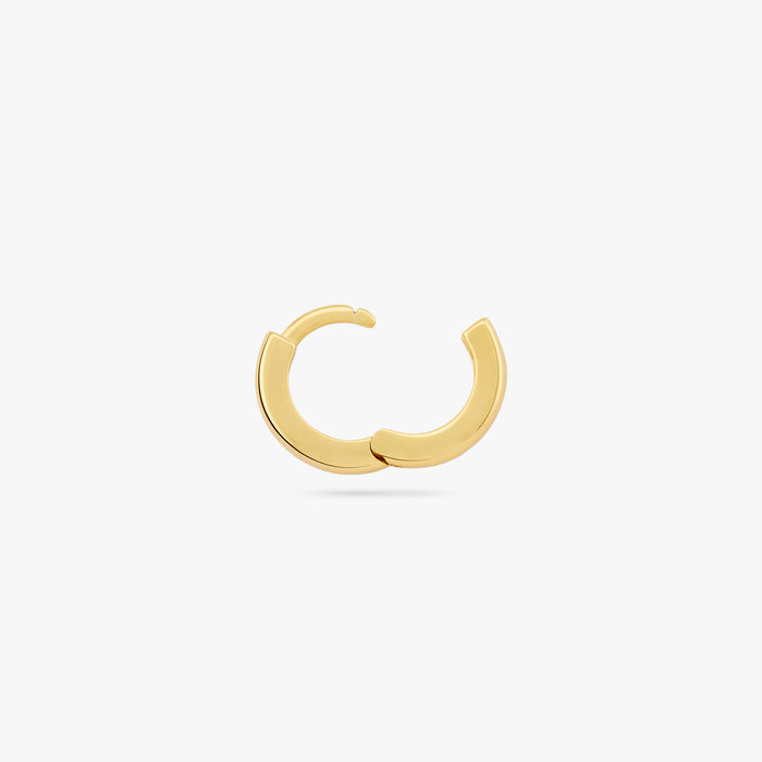Mini sized chunky gold huggie. color:null|gold