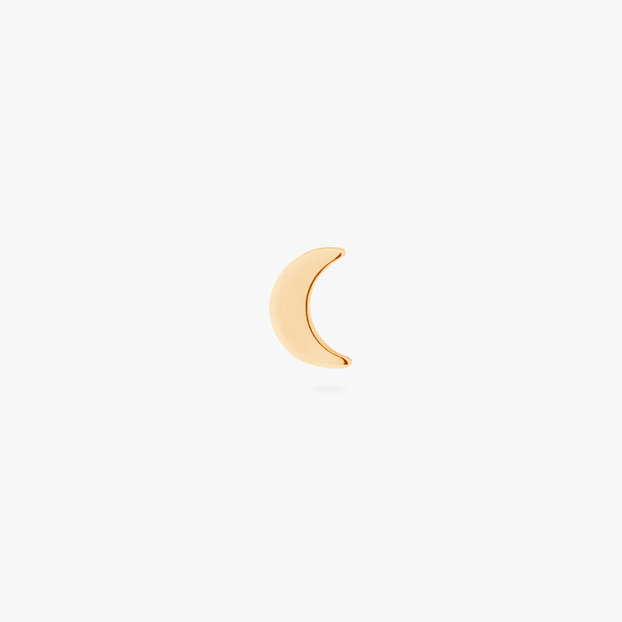 This is an image of a gold moon shaped flatback top with a gold labret with a circle disc with the "S" logo engraved in it. color:null|gold/clear|gold