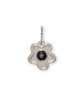 Nana Pendant in Silver. Wavy abstract flower in silver with black agate circle and inlaid rhodolite. S-hook attached.
