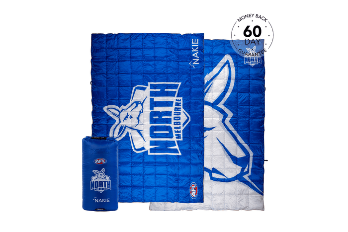 North Melbourne Kangaroos blue quilted puffy blanket with white kangaroo logo and text, shown unfolded and in carry bag.