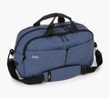 Three-quarter view of Pakt One duffel with two zip compartments, front pocket, top handles, and shoulder strap
