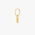 this image shows a 14k gold plated huggie with a twisted pasta charm.