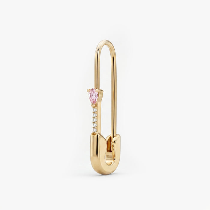 This is an image of a 14k yellow gold plated brass earring shaped like a safety pin with a pink pear cut CZ stone and 5 clear accent stones below the pear CZ.