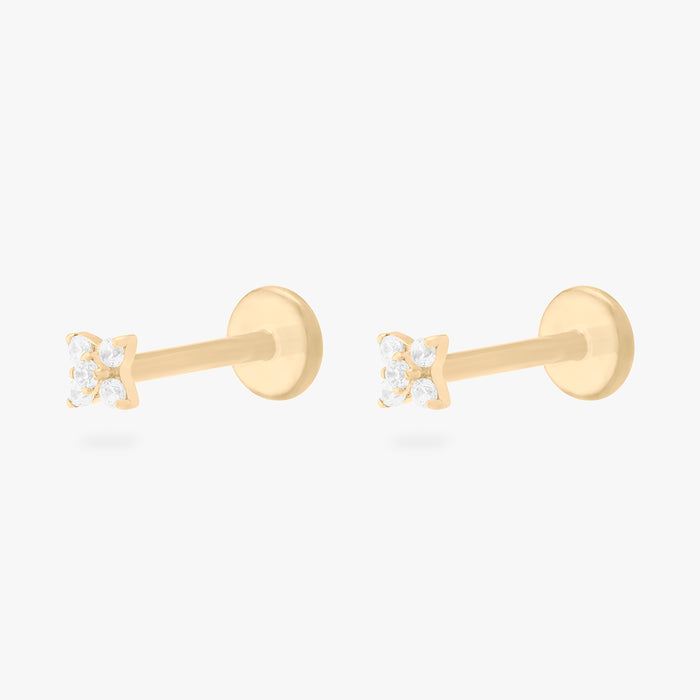 This is an image of a pair of gold-toned flatback studs that have pave cz stones in the shape of an X. [pair] color:null|gold/clear