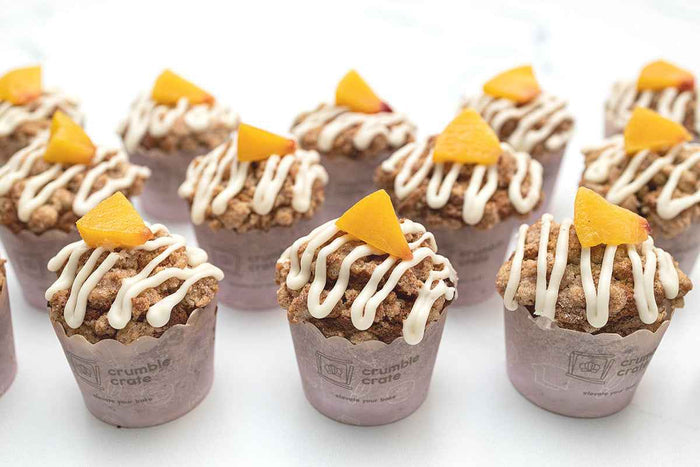Peaches and Cream Muffins by Crumble Crate