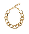 Porto Chain features oversized abstract links in gold-plated brass in a white background.