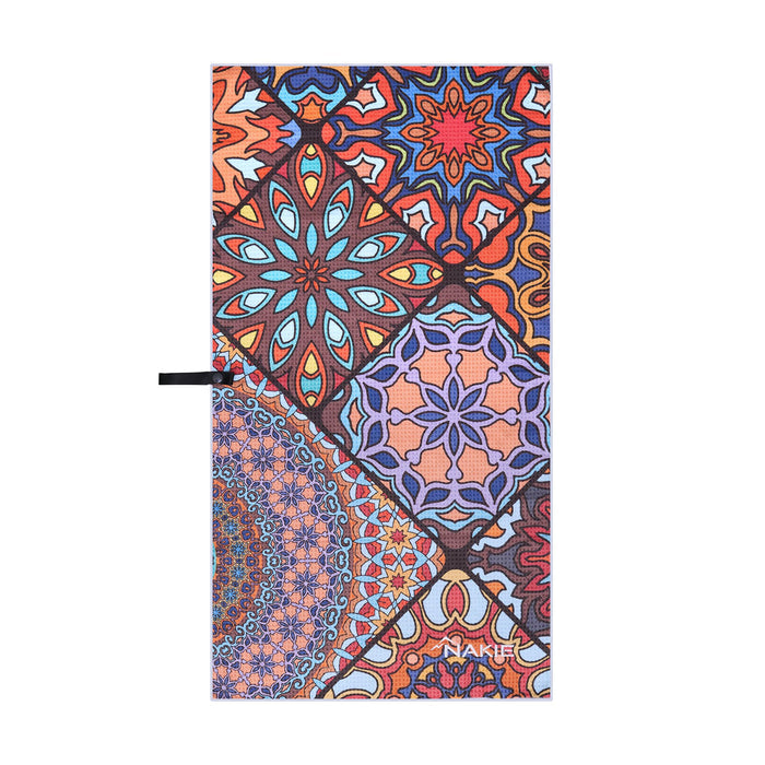 Recycled gym towel with vibrant geometric mandala pattern in red, blue, orange, and peach tones