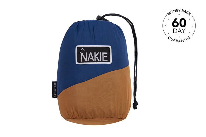 Navy and tan recycled nylon stuff sack with NAKIE logo patch and black drawstring closure