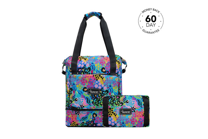 Colorful recycled nylon tote bags with abstract leopard and dot pattern, black straps, shown as a set of two.