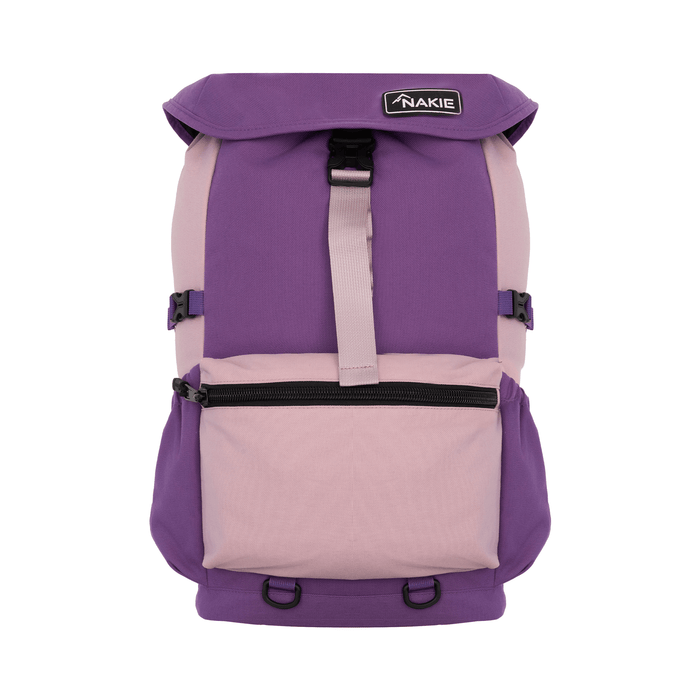 Purple and pink colorblock backpack with flap top, front pocket, and adjustable straps, front view