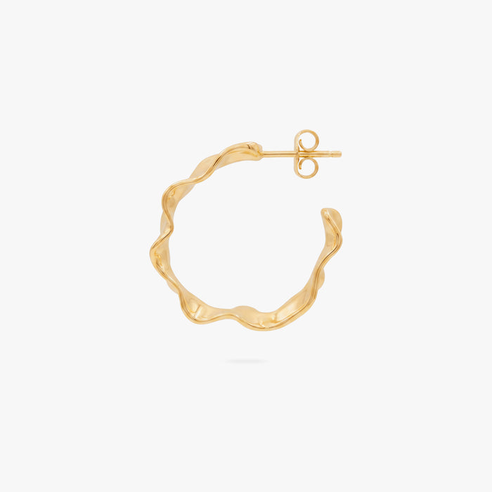 This image shows the profile view of a 14k gold plated hoop with an organic shape around the hoop