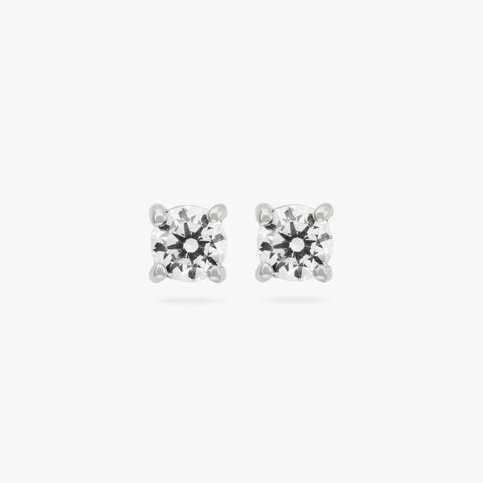 This is a small silver stud with a clear cz accent color:null|silver/clear