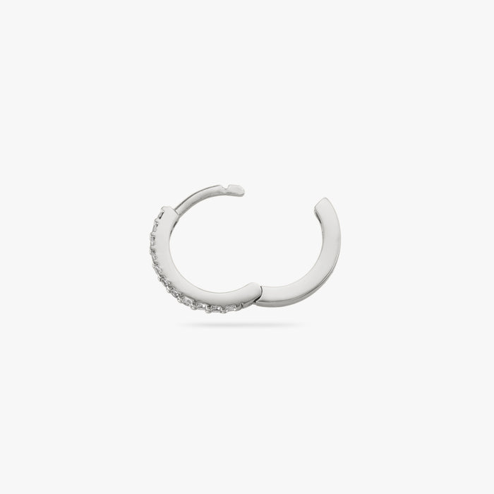 Silver huggie with clear CZs lining the front. color:null|silver/clear