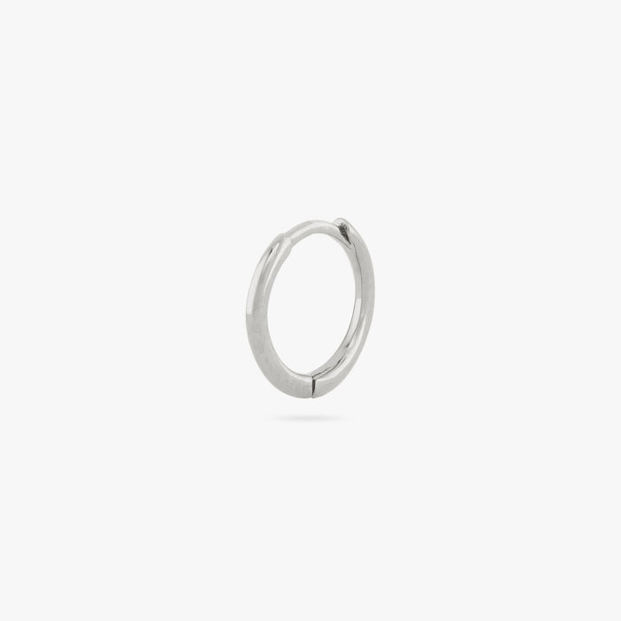 Small slim silver huggie. color:null|silver