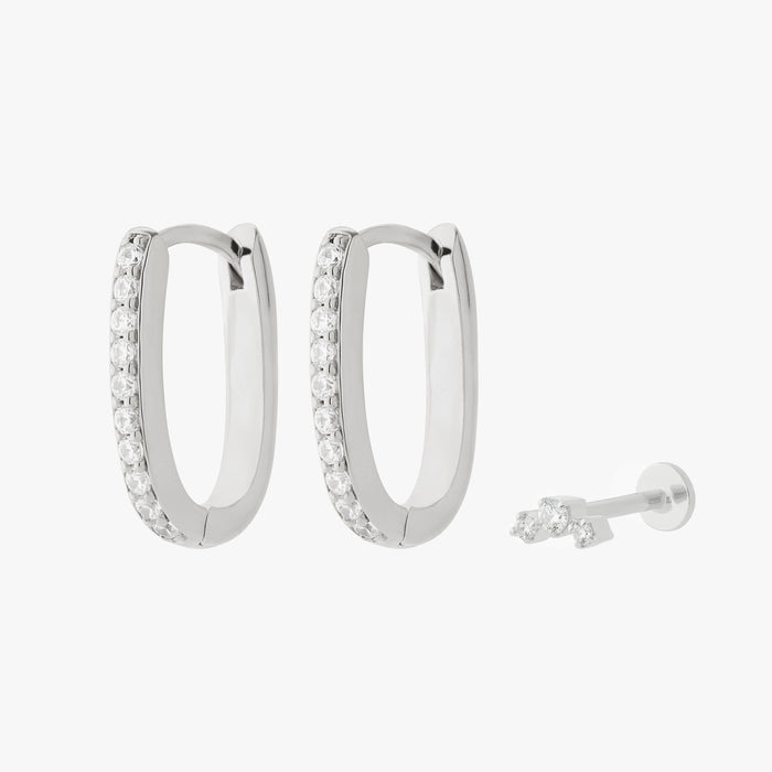 Silver earscape featuring a pair of Pave Oval Hoops and a micro cluster flatback stud with clear stones
