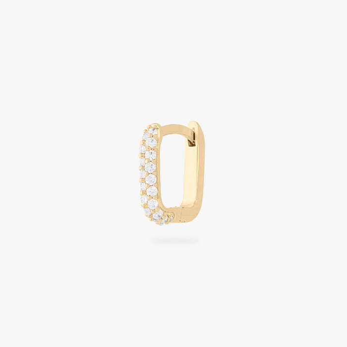 This is an image of a gold-toned, square-shaped huggie with pave CZ stones. color:null|gold/clear