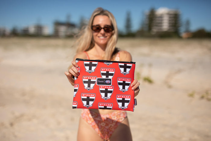 Red St Kilda Saints AFL recycled sand-free beach towel with repeated club crest logo pattern