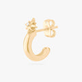 This is an image of a 14K gold plated stud with a twinkle star with a crystal CZ that is shaped like a hoop against a white background.
