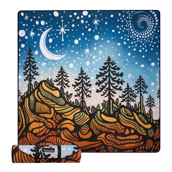 Recycled picnic blanket with night sky, moon, stars, evergreen trees, and orange wavy landscape pattern