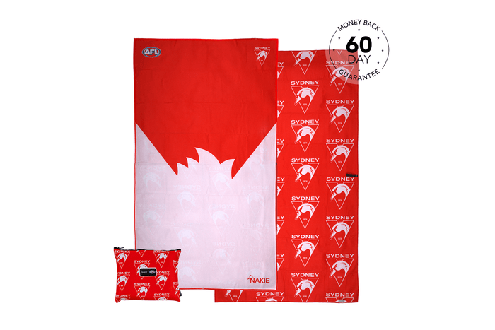 Sydney Swans red and white beach towel with swan logo, displayed flat with matching small pillow, includes 60-day money back