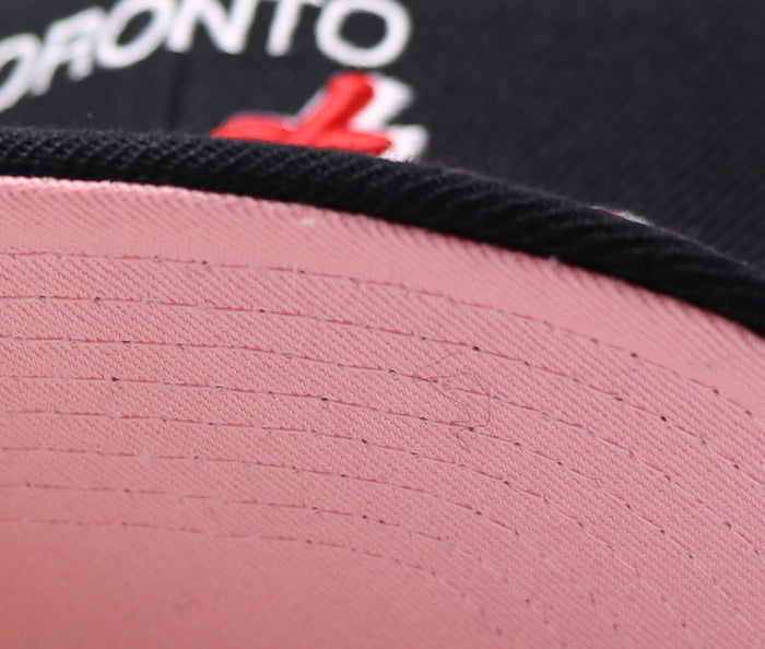TORONTO RAPTORS (BLACK) SCRIPT MITCHELL & NESS SNAPBACK (PINK UNDER VISOR)
